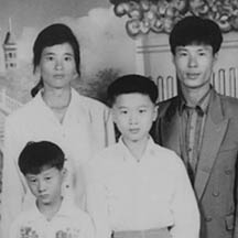 Zheng Fong-Zhen, with her husband and sons in China.
